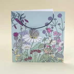 Card with butterfly necklace