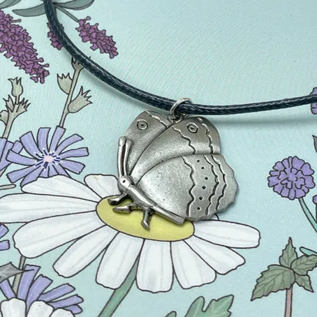Card with butterfly necklace