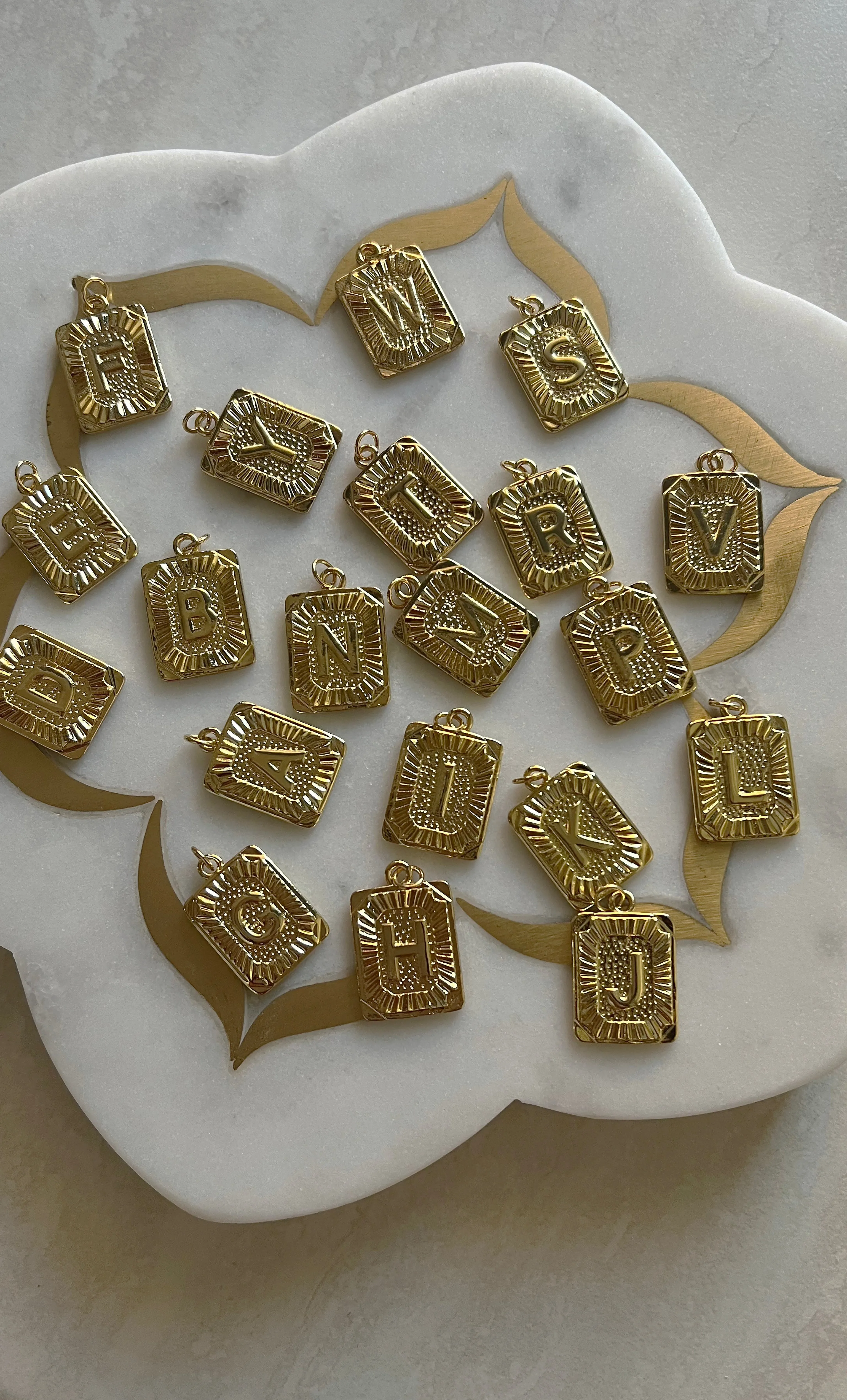 The Tunik Namesake Charm Necklace