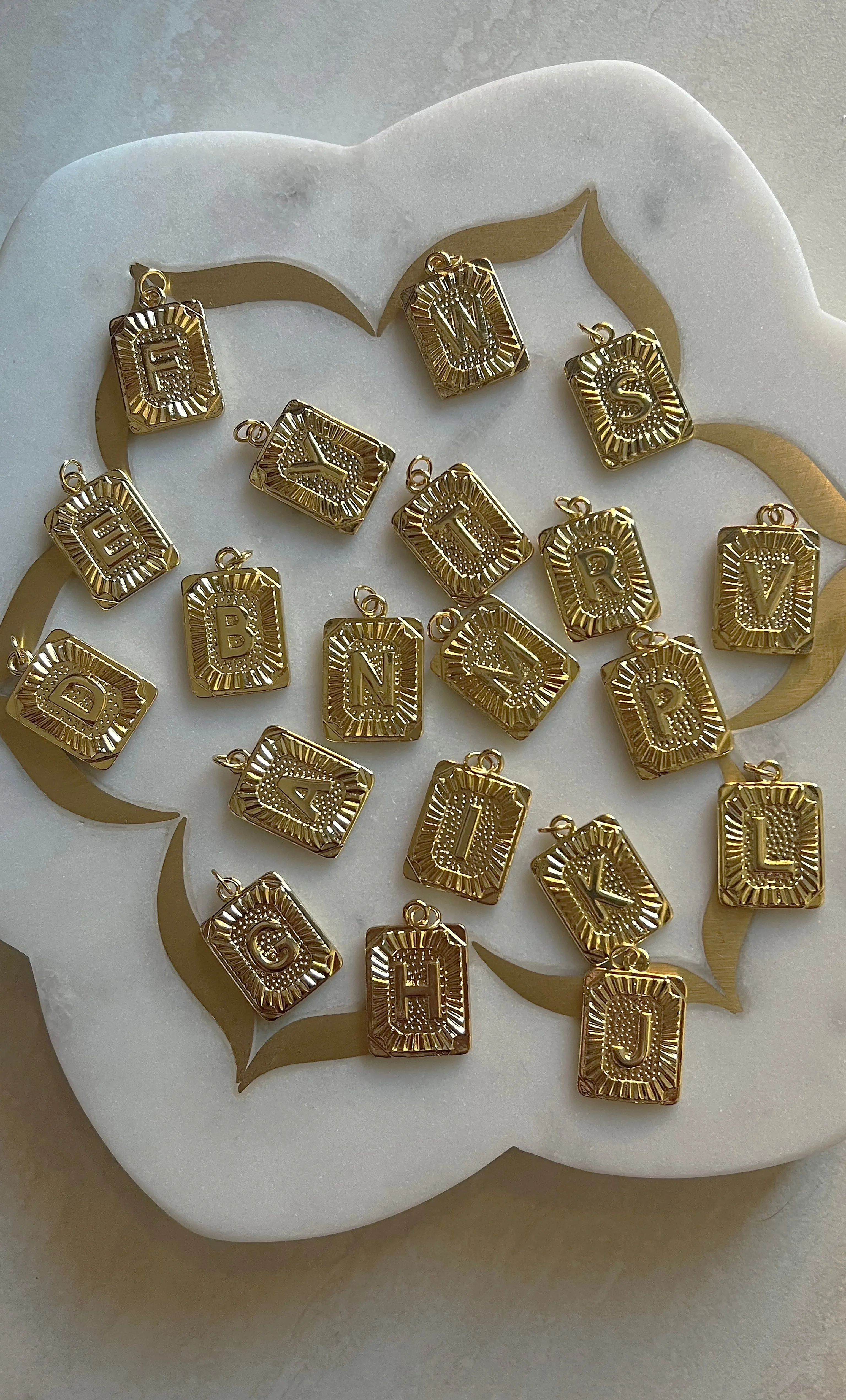 The Tunik Namesake Charm Necklace