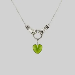 UNITE. Hand Grasping Green Glass Heart Necklace - Silver